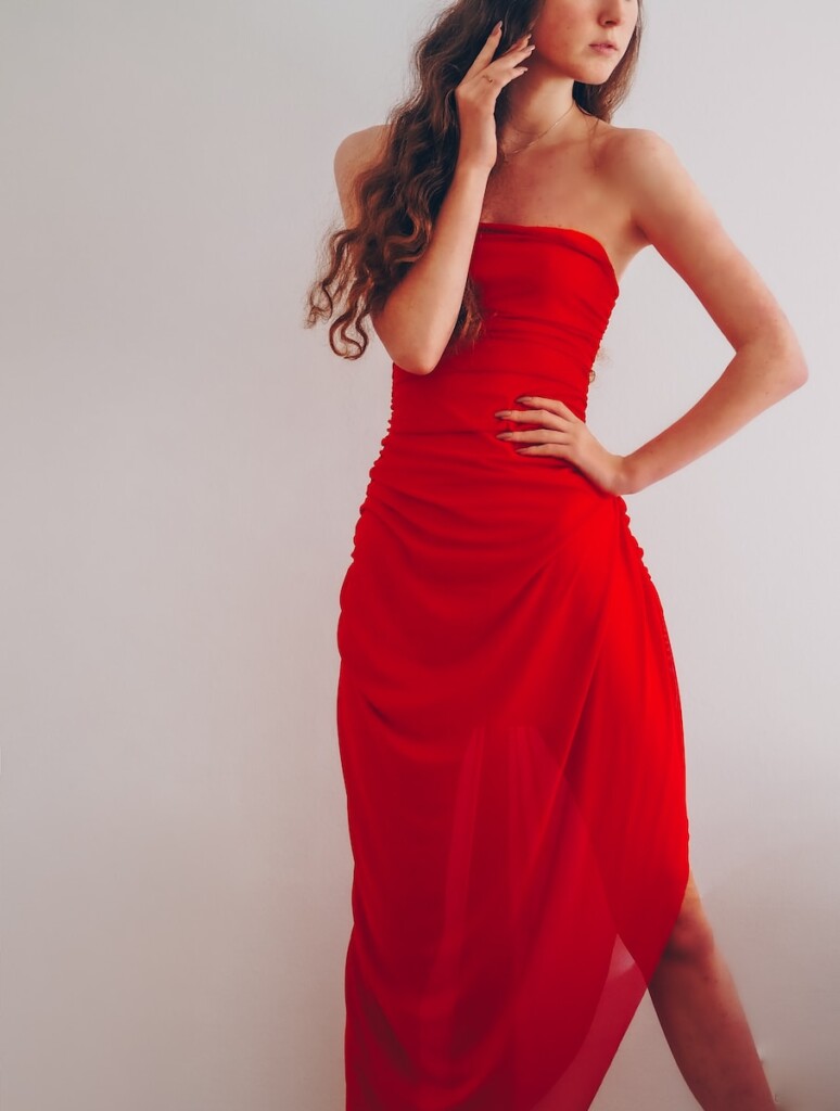 woman in red tube dress